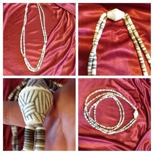 Double stranded long beaded necklace.